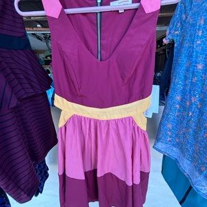 Beautiful cut-out sides dress brand new with tags